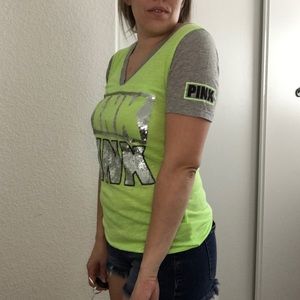 Pink sequin green T-shirt.